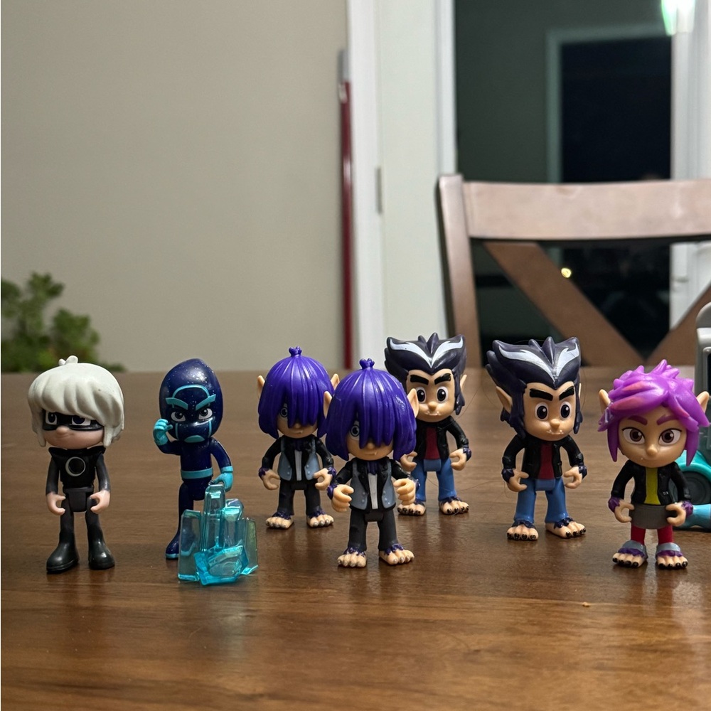 Vibrant Action Figure Set with Purple and Black Characters